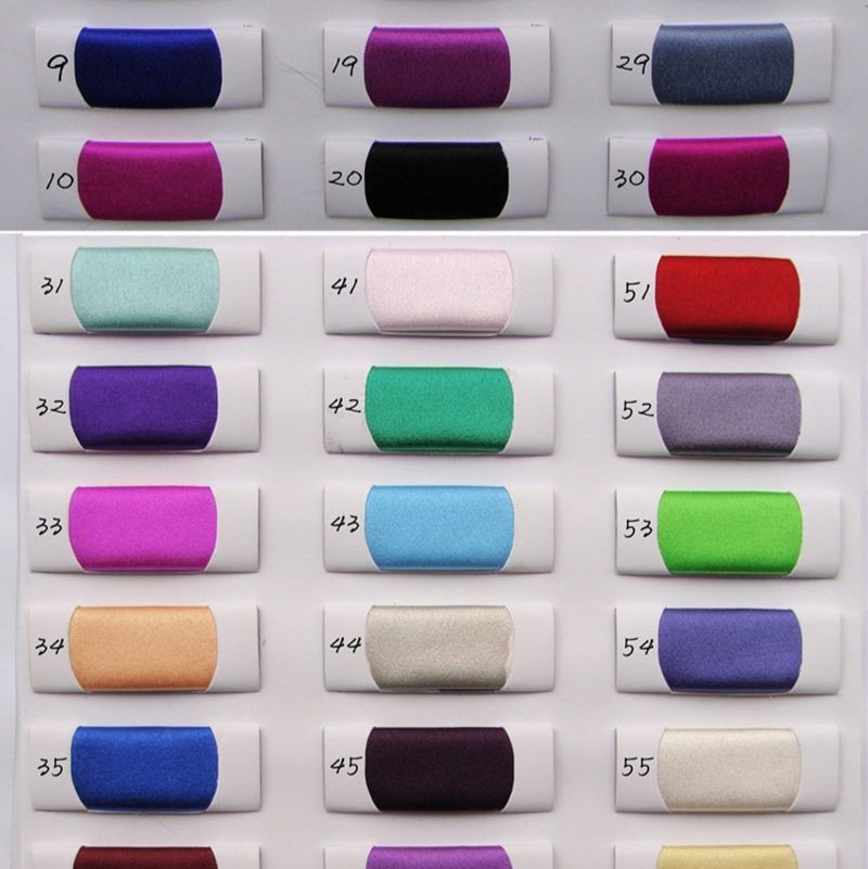 Set of fabric swatches in various colors arranged in a grid.