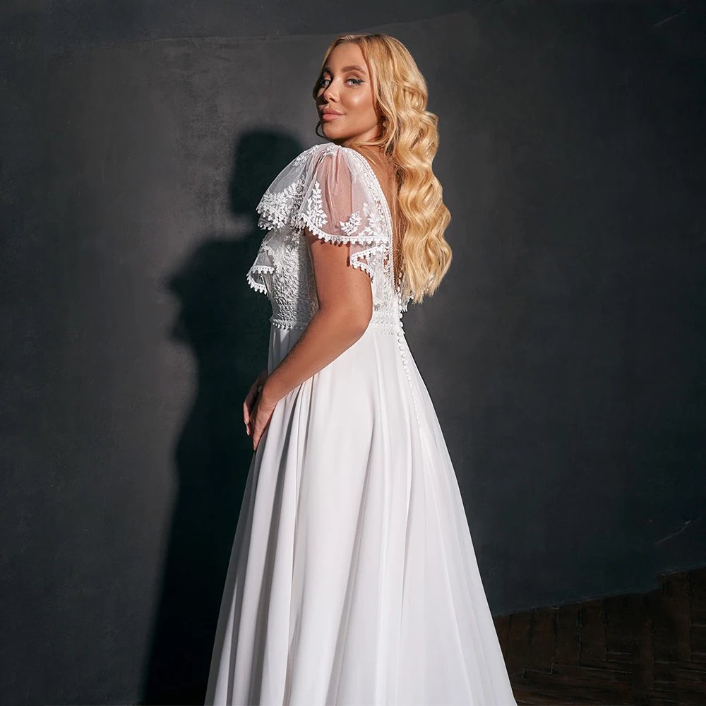Illusion short sleeve chiffon wedding dress with appliqué lace detail
