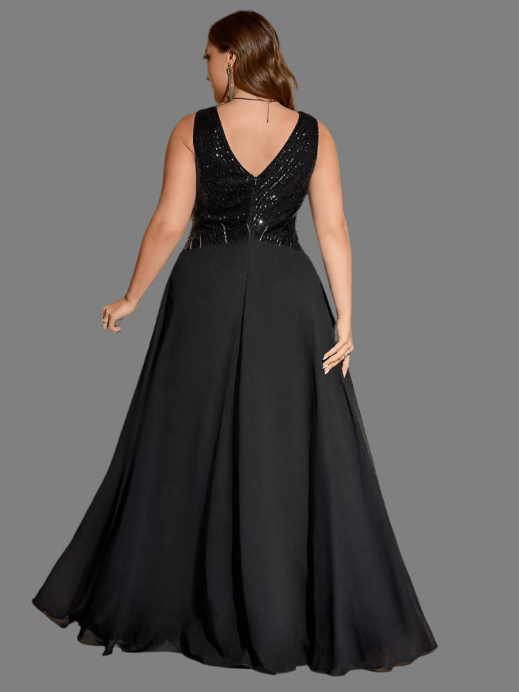 Open v style back sequinned for glitter. A-line style made in beautiful flowing chiffon fabric