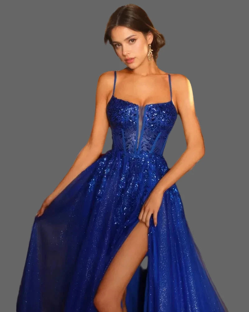Blue A-line formal dress close-up: glitter corset bodice with thin straps and side slit