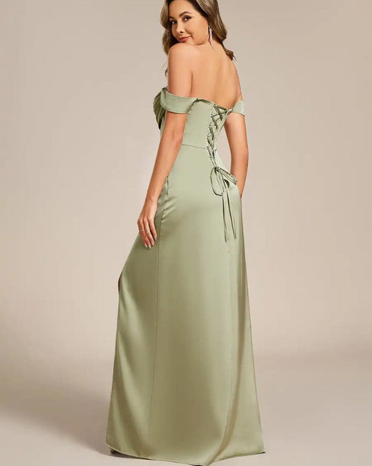 Off-shoulder sage satin split dress with bow-tie back and long front slit
