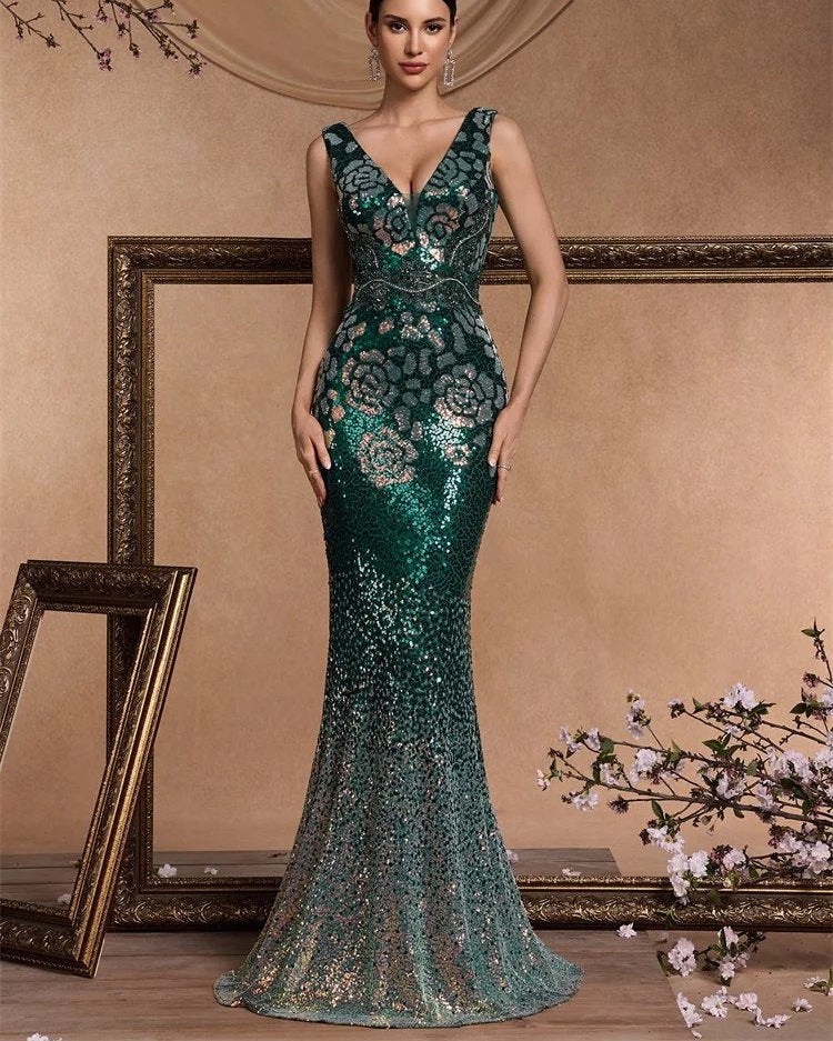 Green sequin mermaid V-neck sleeveless gown with floral beadwork, flared bottom