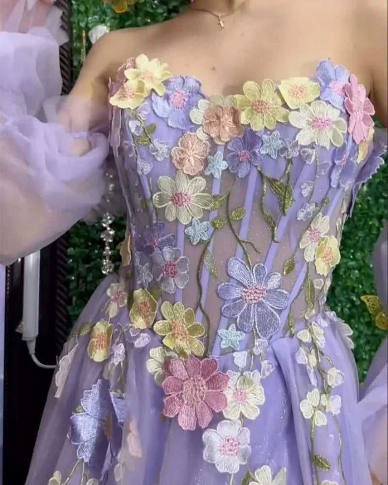 Lilac strapless tulle bodice with colorful 3D flower appliqués and sheer fabric accents