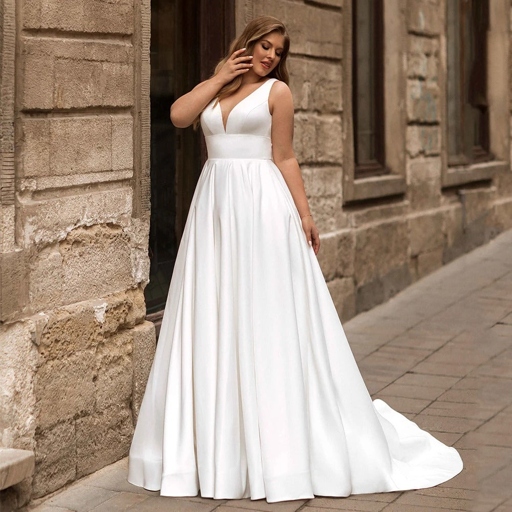 Plus size ivory satin sleeveless wedding gown