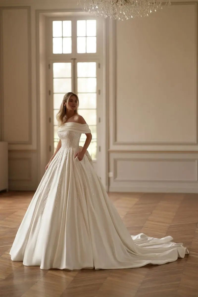 Off the shoulders beaded bodice satin bridal gown with back bow-formal elegance