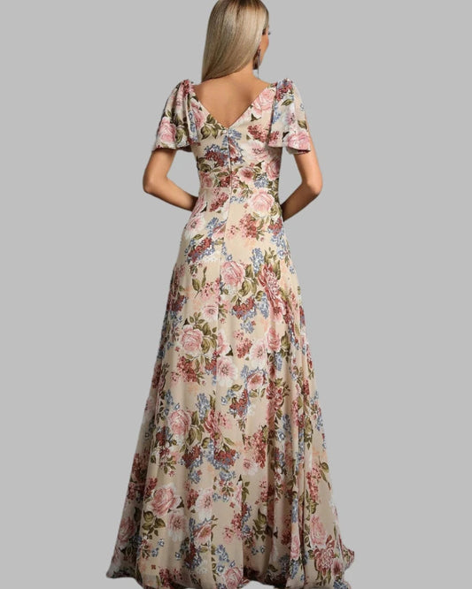 Floral chiffon maxi dress, back view, short puff sleeves, A-line silhouette.