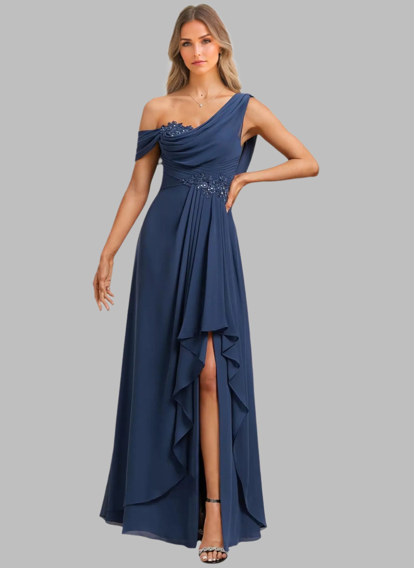 Navy blue one-shoulder evening gown with beaded details on a white background