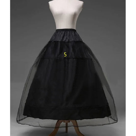 Black petticoat on dress form, tiered tulle and satin band at waist