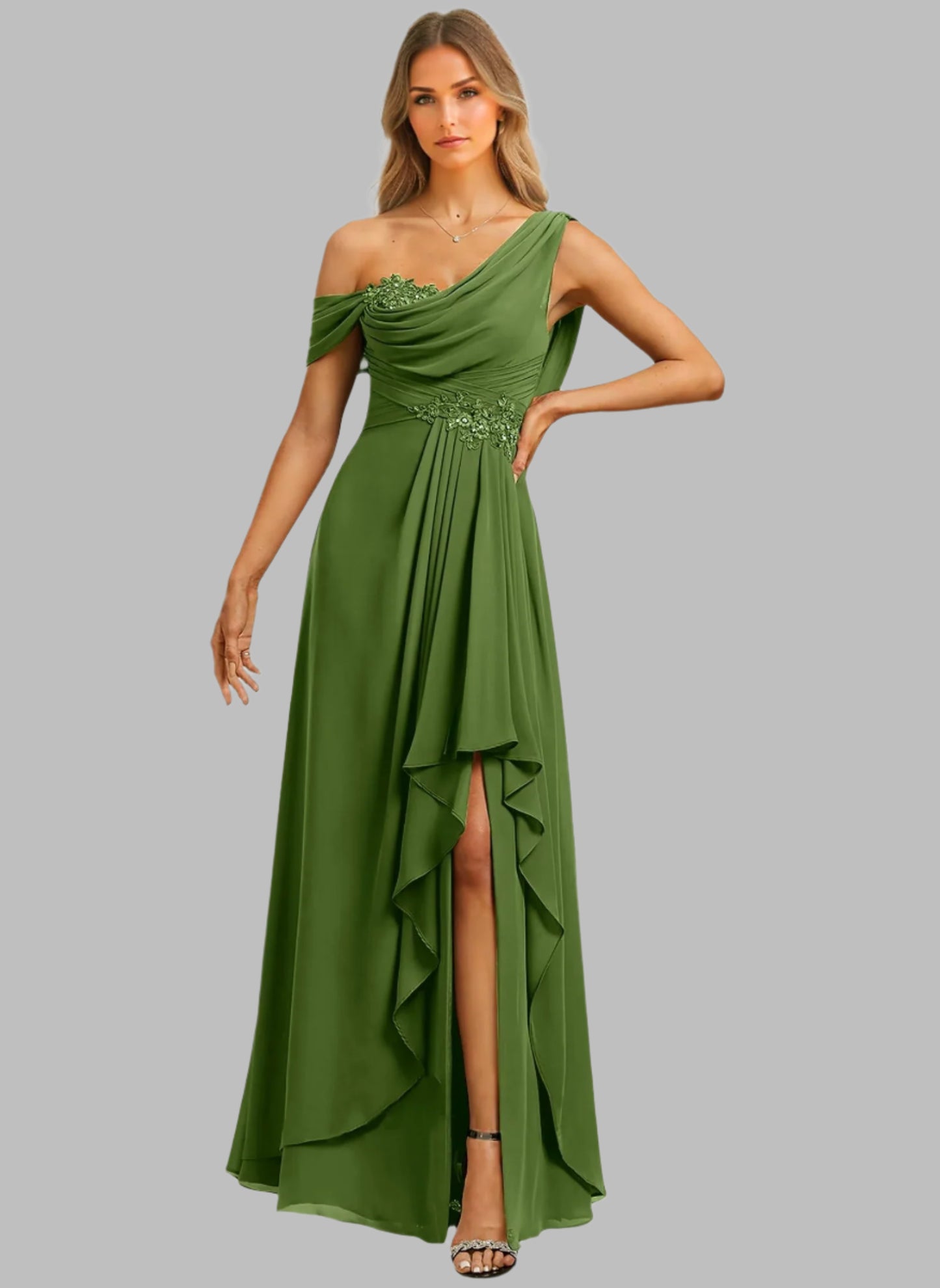 Green one-shoulder evening gown with embellishments on a white background