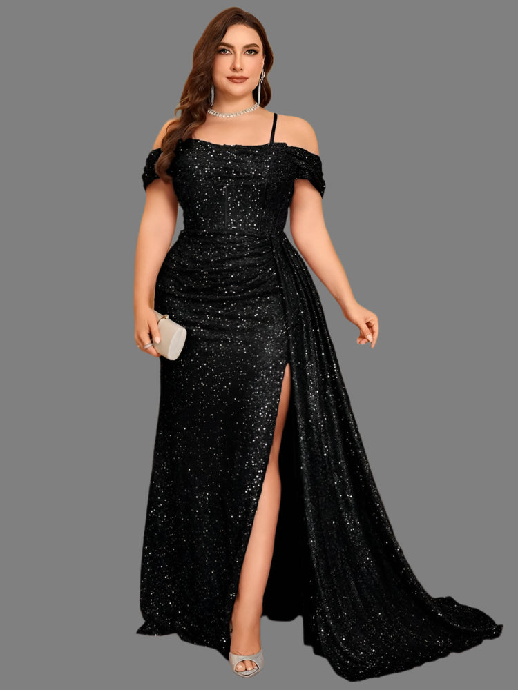 Woman in a black sparkly sequin party dress with leg split and side streamer train