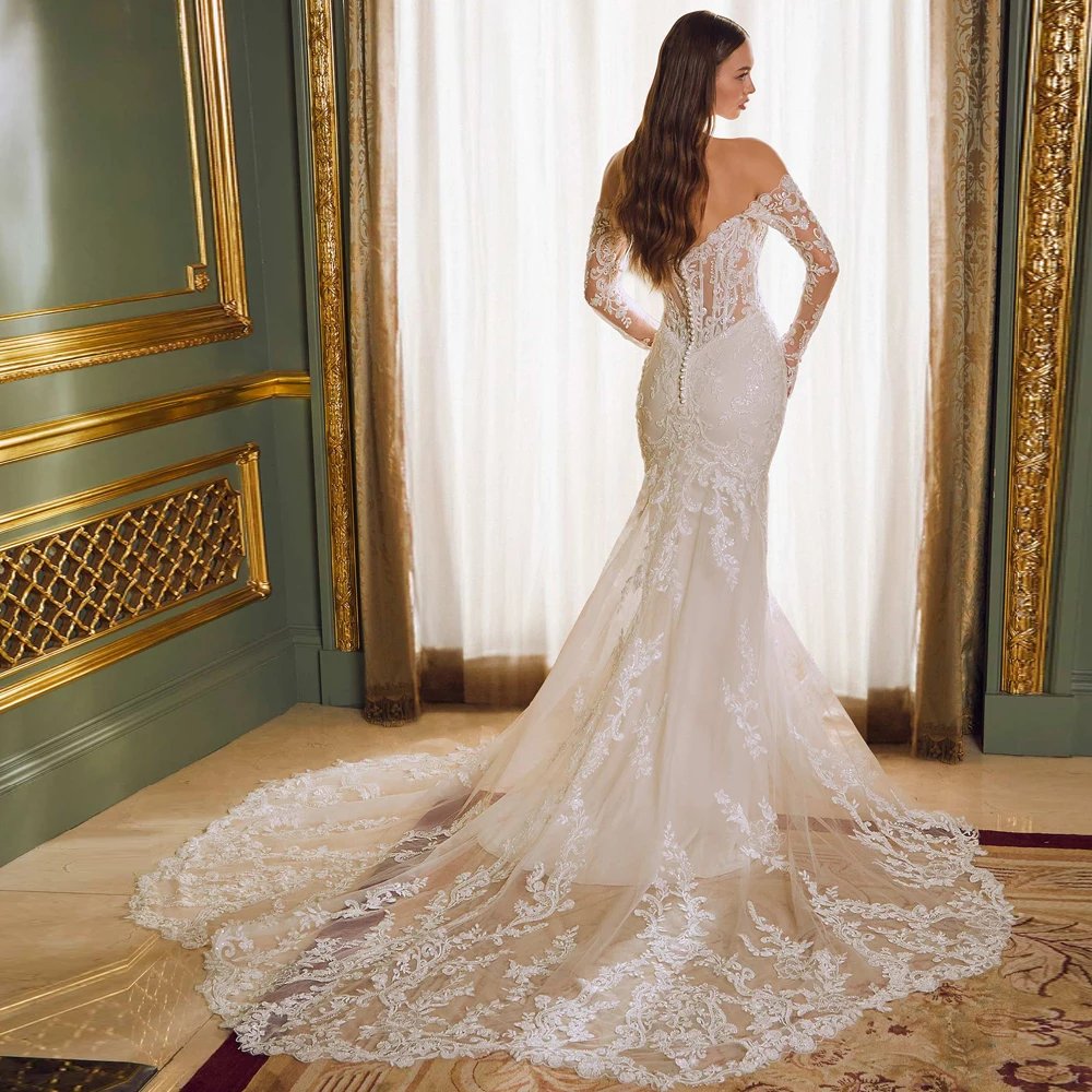 Mermaid trumpet design wedding gown. Made with all over lace and satin lining available in white, ivory or champagne options sizes 2-26w