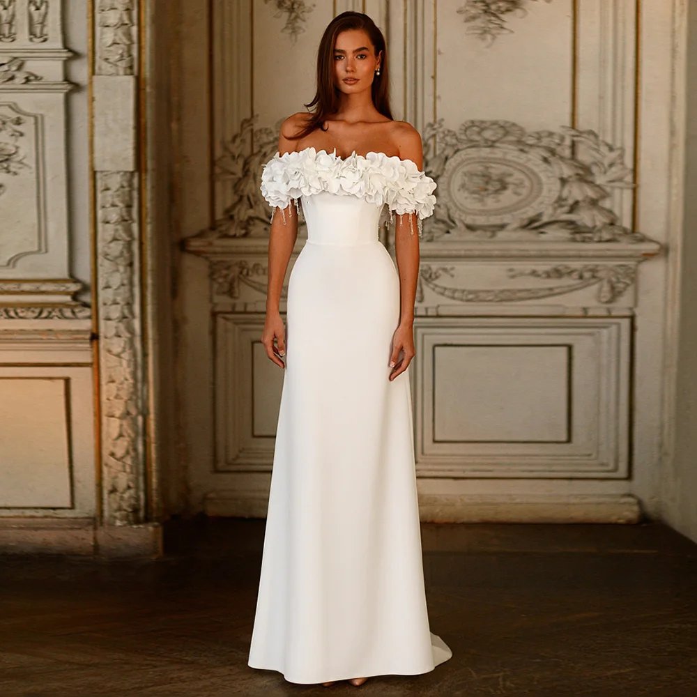 White or ivory 3D flowers with beading strings. Strapless off the shoulder simple style wedding dress made from crepe.