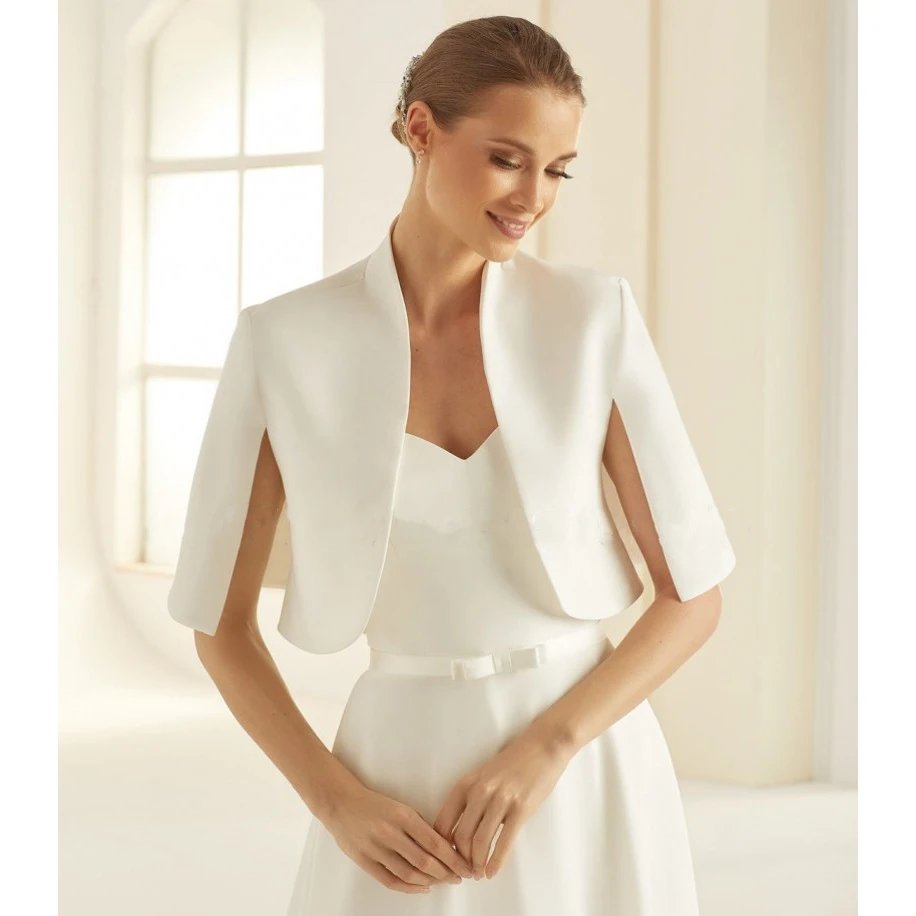 cape style white or ivory satin bolero. This jacket comes in sizes 2-24W and available in customised colours