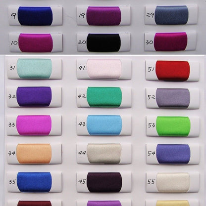 Set of fabric swatches in various colors arranged in a grid.