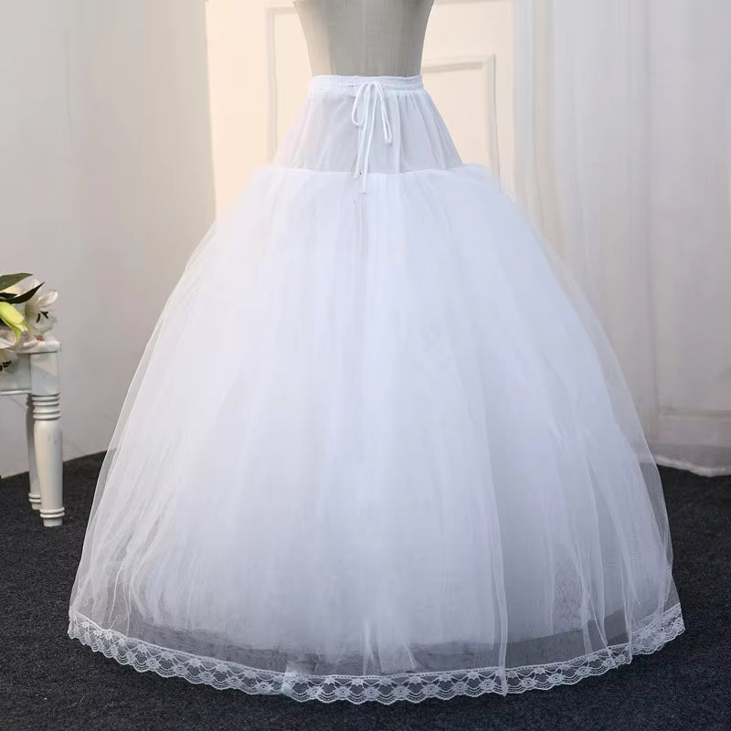 White hoopless tulle petticoat full back view with scalloped lace trim hem
