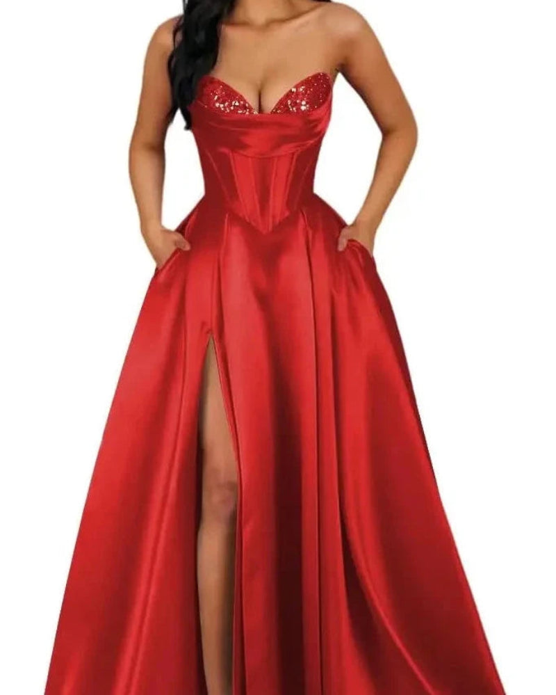 Red strapless A-line satin dress with sequin bust and thigh-high slit