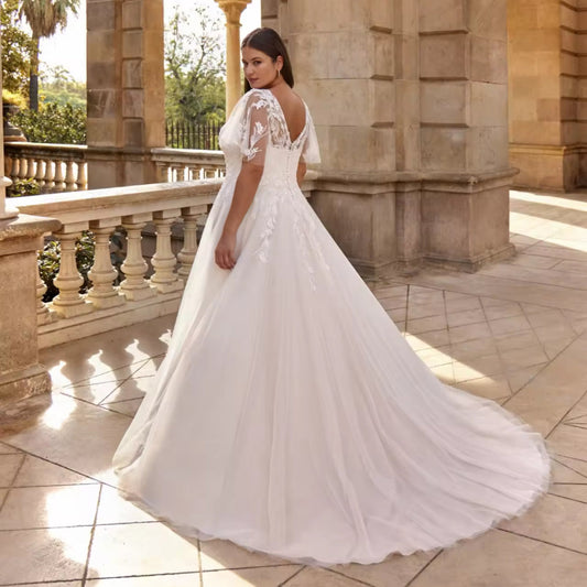v back with a court train lace and tulle plus size wedding dress-Formal Elegance