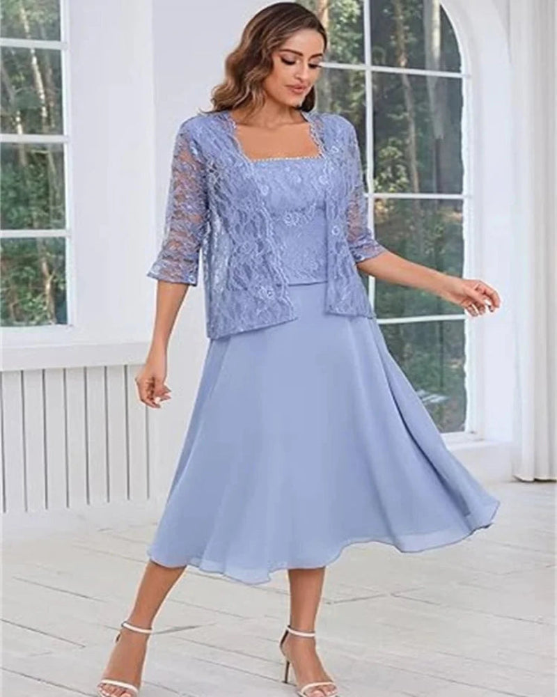 Light blue two-piece dress set with lace overlay top and A-line chiffon midi skirt, standing pose