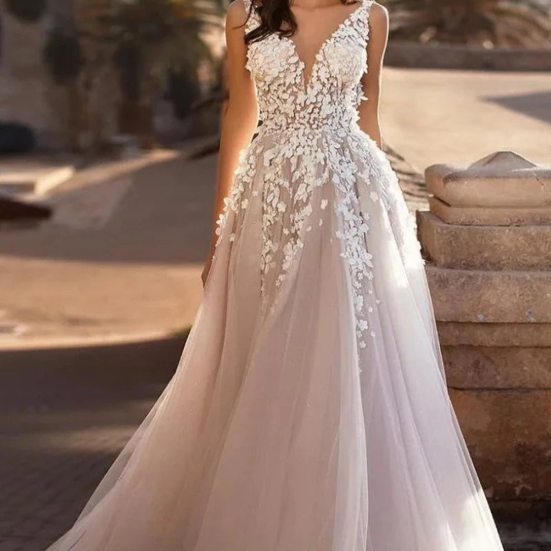 Ivory V-neck tulle wedding dress with floral lace bodice and full A-line skirt