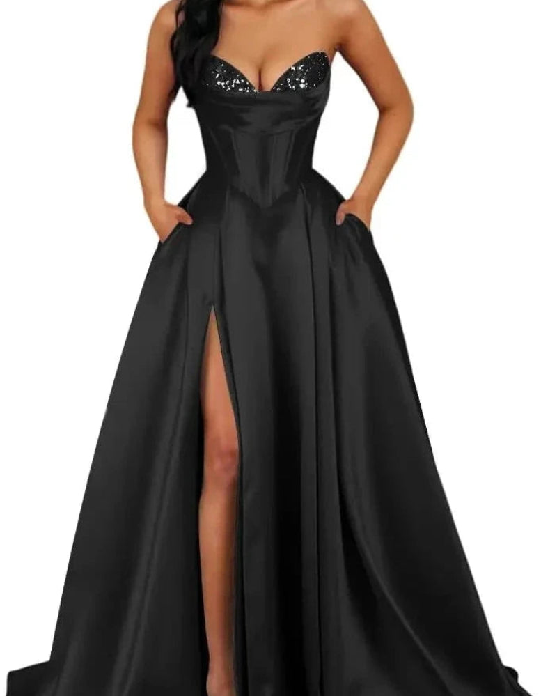Strapless A-line satin dress with sequin bust and front slit, black.