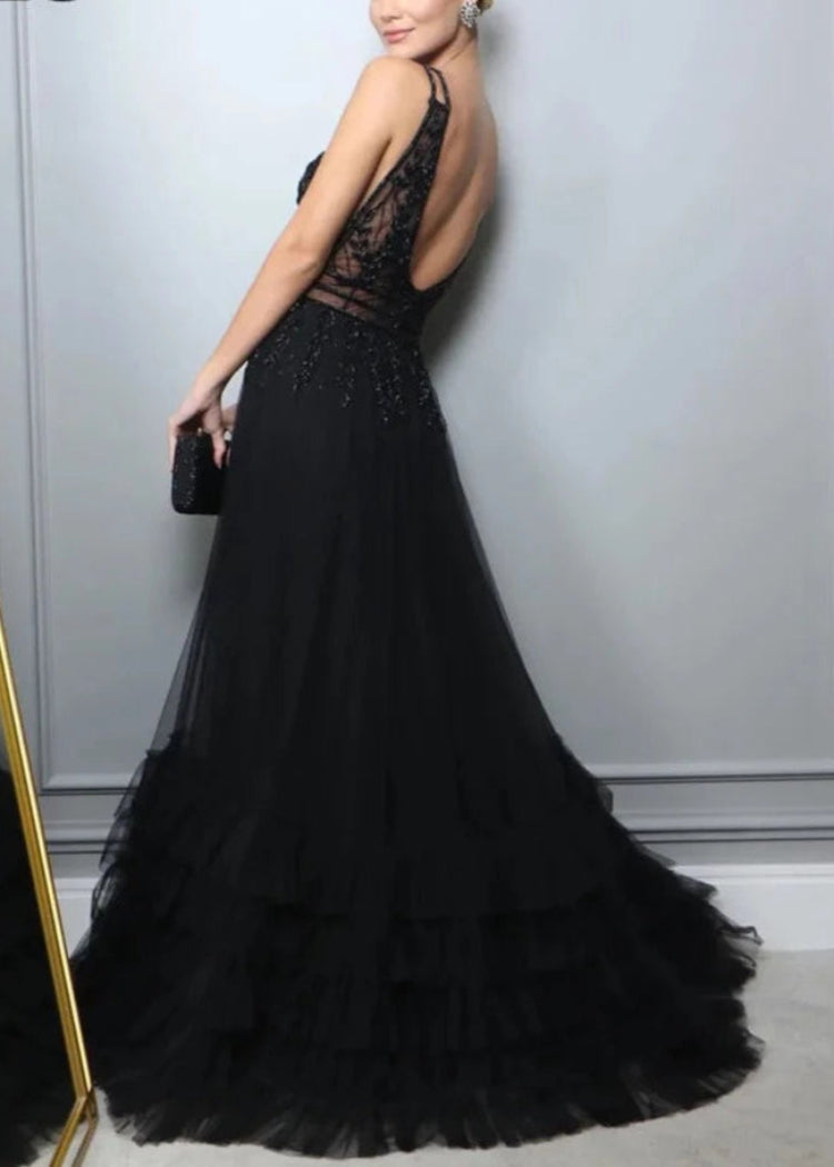 Black A-line evening dress, lace bodice with open back and flowing ruffled skirt