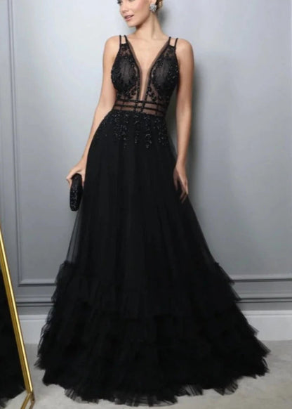 Black A-line evening dress with V-neck illusion bodice and ruffled tulle skirt
