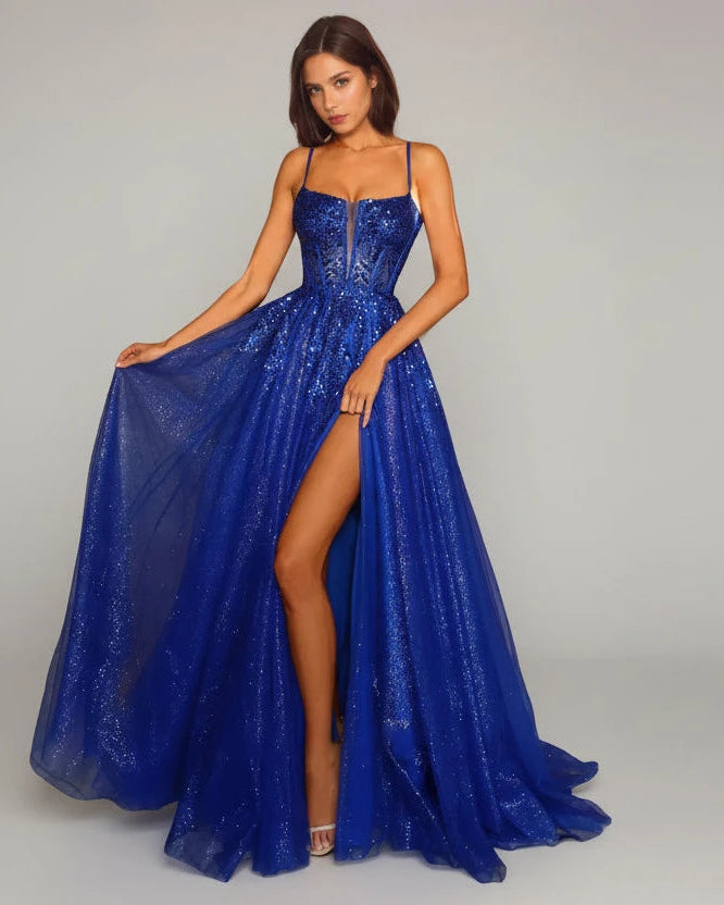 Blue A-line formal dress with sparkly corset bodice and flowing tulle skirt, side slit