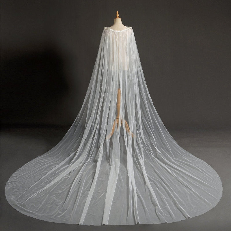 Ivory bridal cape veil with layered tulle and long flowing train