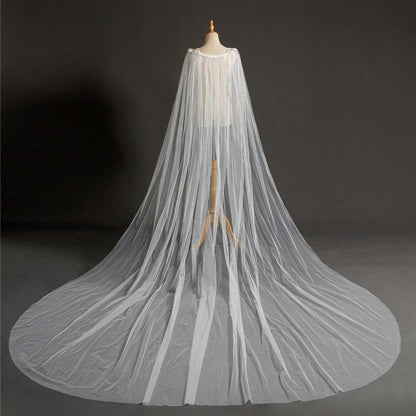 Ivory bridal cape veil with layered tulle and long flowing train