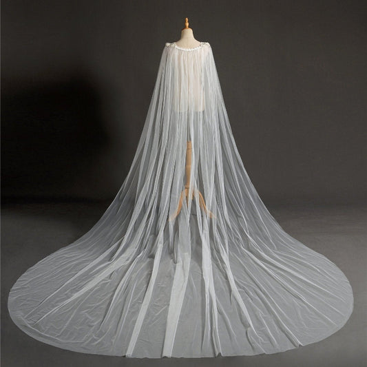 Ivory bridal cape veil with layered tulle and long flowing train