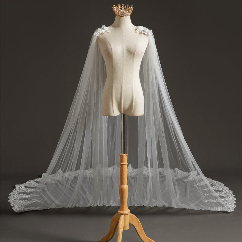 Bridal tulle cape veil with lace shoulder appliques and wide scalloped hem