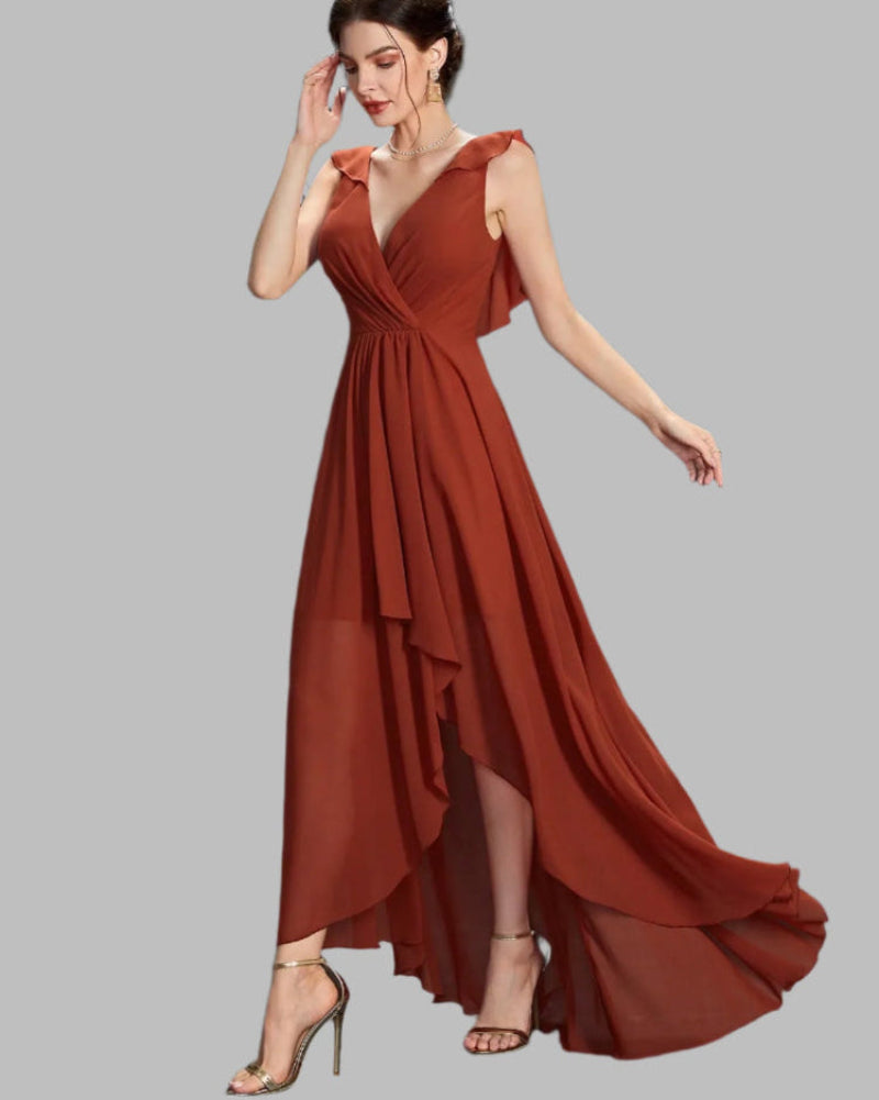 Woman wearing a rust colour A-line high-low bridesmaid chiffon dress