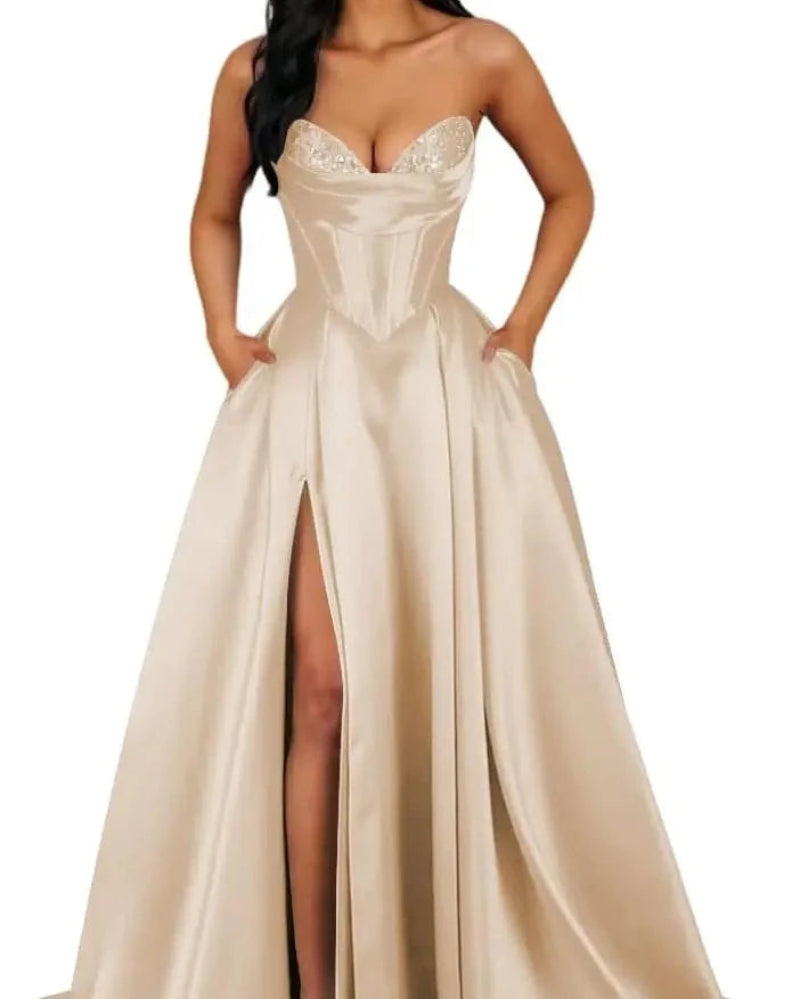 Champagne strapless A-line satin dress with sequin bust and thigh-high slit
