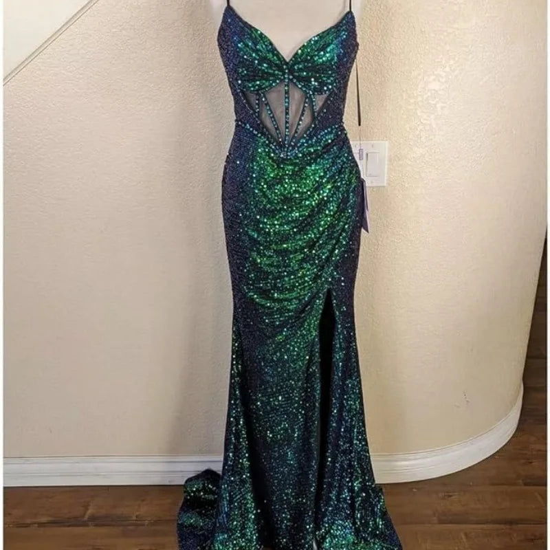 Navy and green sequin mermaid spaghetti-strap dress with V neckline and bow detail