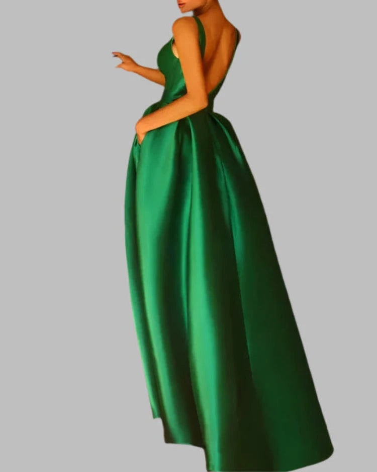 Emerald green satin v-neck evening gown with side leg slit and gathered skirt