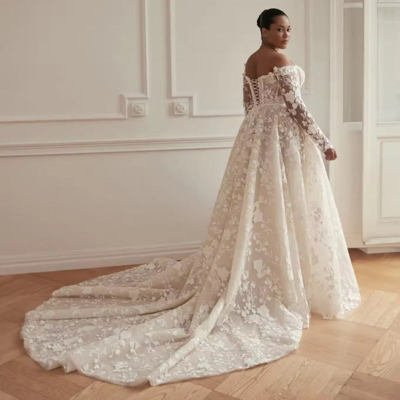 Off-shoulder lace wedding dress with floral lace back and long train, sheer sleeves