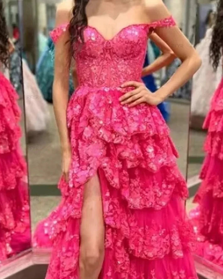 Pink sweetheart lace formal gown with sparkly layered skirt and front thigh slit