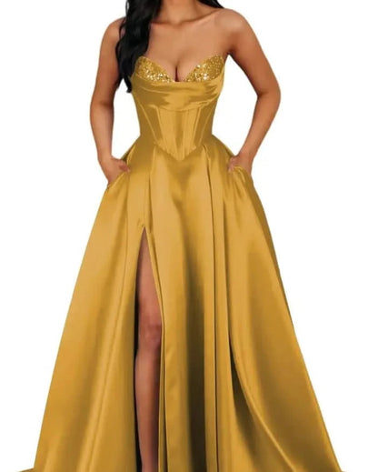 Strapless A-line satin dress with sequin bust and front slit, gold.