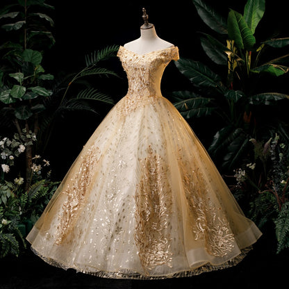 Champagne ball gown with gold botanical lace appliques and sparkling tulle skirt