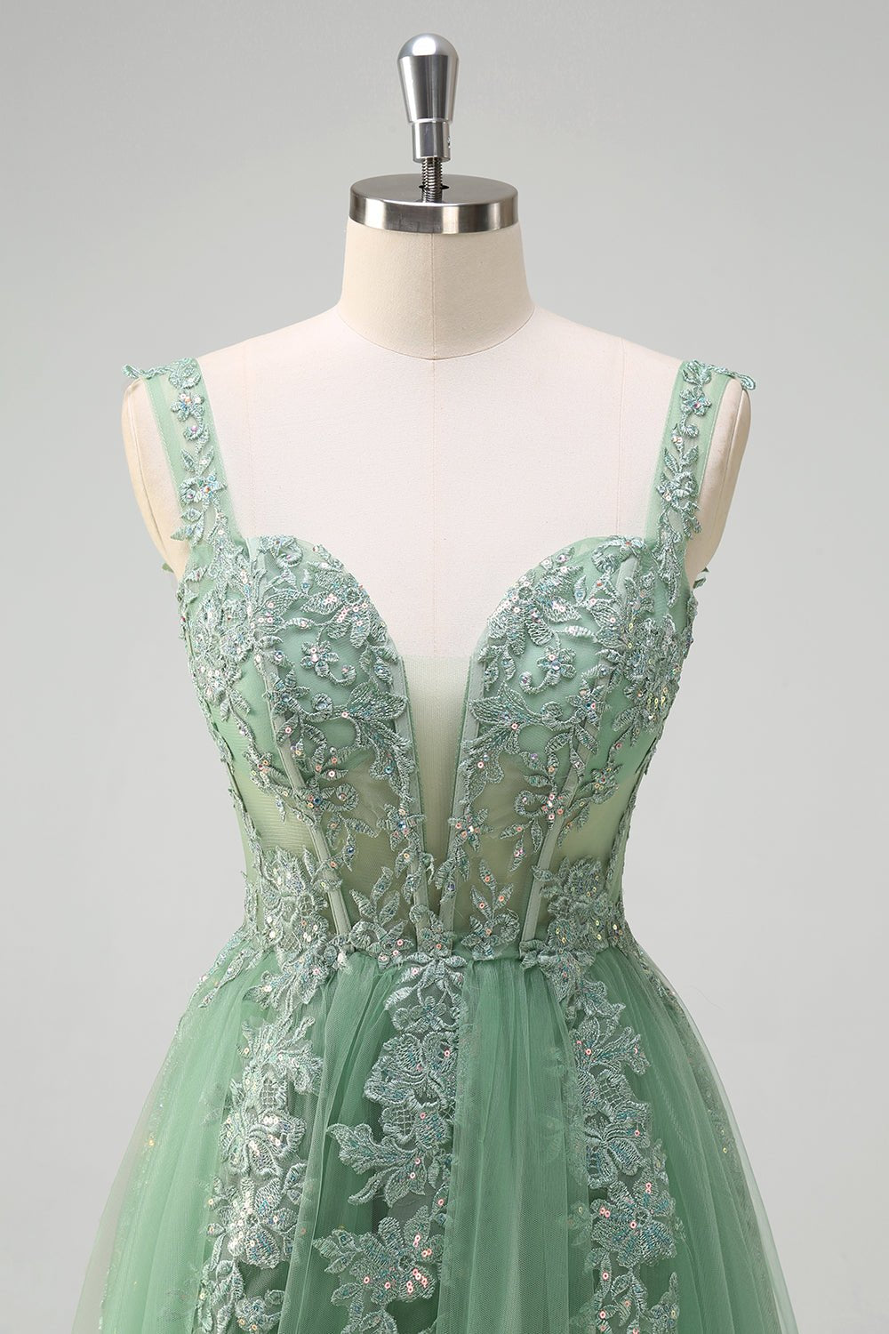 Green lace tulle corset bodice dress with V-neck and wide shoulder straps