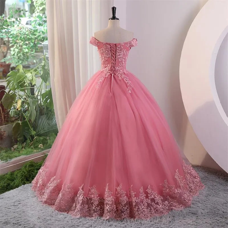 Off-shoulder lace ball gown with textured bodice and full A-line skirt, rose-pink.