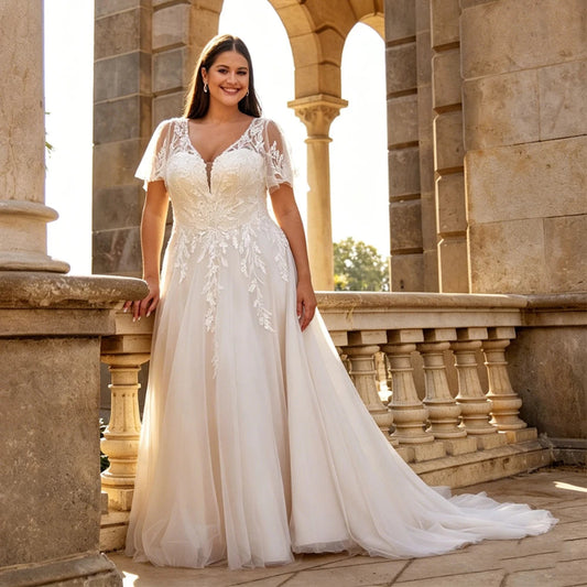Woman in a lace and tulle short sleeve plus size wedding dress -formal elegance