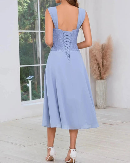 Light blue two-piece dress set with lace overlay top and A-line chiffon midi skirt, back view