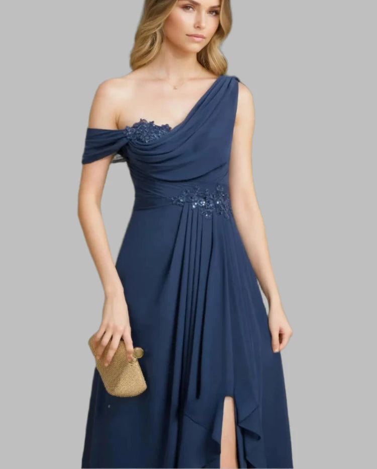 Navy chiffon one-shoulder A-line dress with jeweled side waist detail and cascading ruffle hem