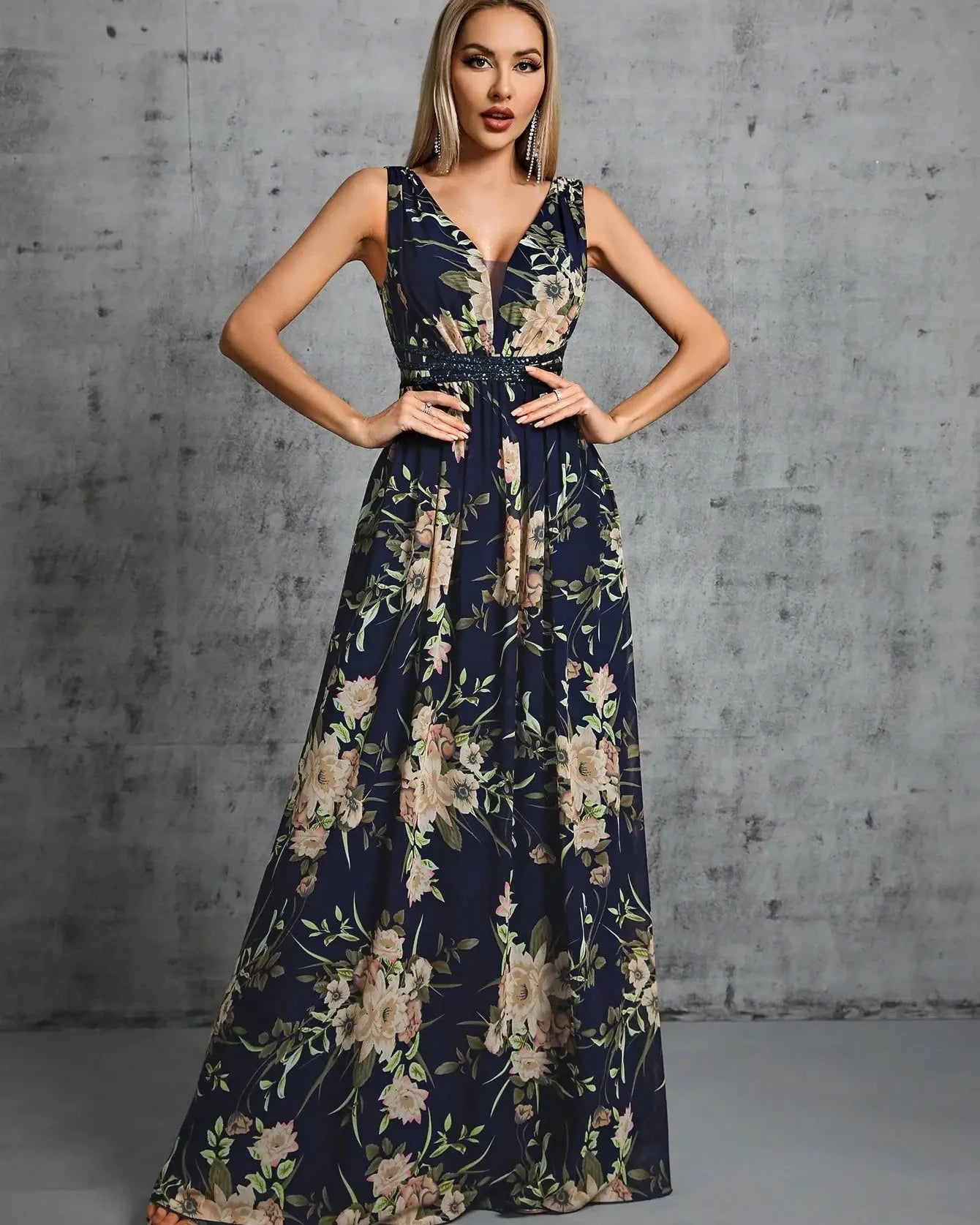Navy chiffon maxi dress, A-line silhouette with V-neck and sleeveless floral print.