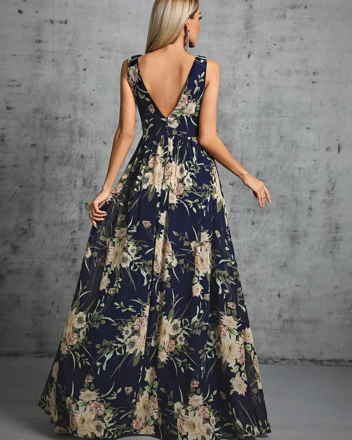 Navy floral chiffon maxi dress, A-line with open back and V-neck front.