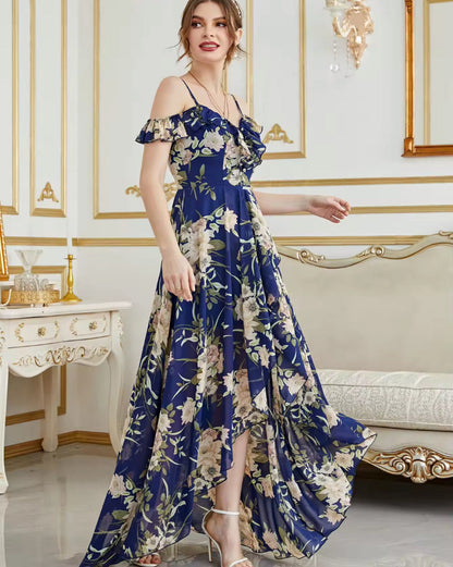 Navy floral chiffon off-shoulder dress with ruffled neckline, spaghetti straps, high-low hem.