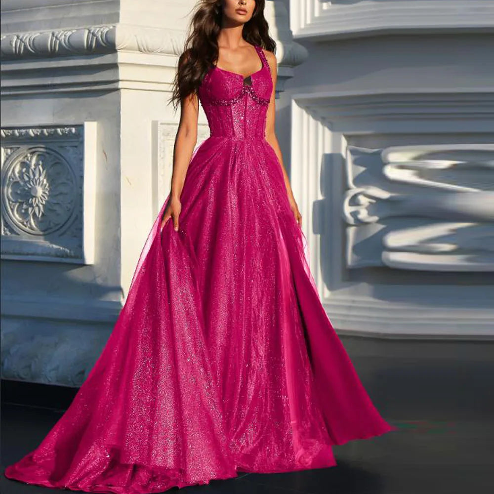 Magenta A-line glitter tulle formal dress with wide straps and fitted corset bodice