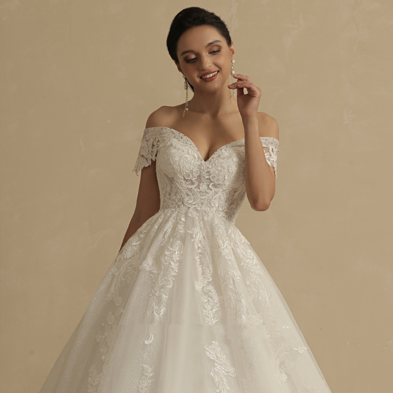 Ivory off-shoulder lace wedding dress bodice with structured corset and scalloped neckline
