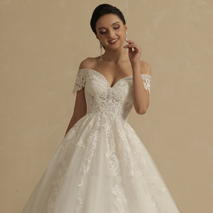 Ivory off-shoulder lace wedding dress bodice with structured corset and scalloped neckline